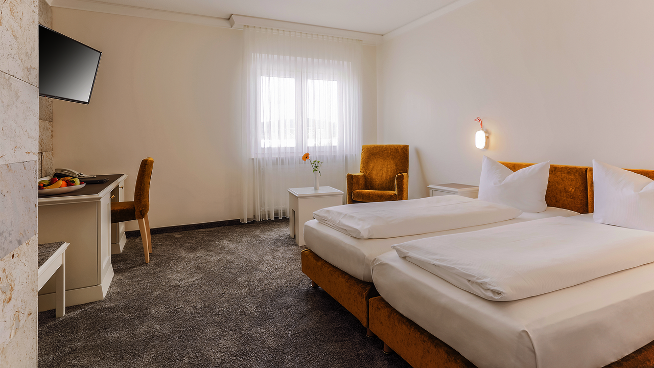 Wohlfühlzimmer Muschelkalk mit einer Wand aus Muschelkalk